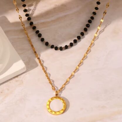 collier double rang avec chaine perles fines noires